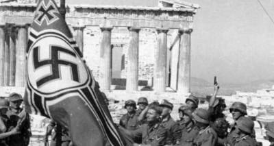 Bild: &laquo;&Mu;ή&pi;&omega;&sigmaf; &omicron;&iota; Έ&lambda;&lambda;&eta;&nu;&epsilon;&sigmaf; &delta;&iota;&kappa;&alpha;&iota;&omicron;ύ&nu;&tau;&alpha;&iota; &pi;&rho;&alpha;&gamma;&mu;&alpha;&tau;&iota;&kappa;ά &alpha;&pi;&omicron;&zeta;&eta;&mu;ί&omega;&sigma;&eta;&raquo;;