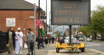 &Beta;&rho;&epsilon;&tau;&alpha;&nu;ί&alpha; &ndash; &Kappa;o&rho;&omicron;&nu;&omicron;ϊό&sigmaf;: &Epsilon;&pi;&iota;&sigma;&pi;&epsilon;ύ&delta;&epsilon;&iota; &tau;&eta; &delta;&epsilon;ύ&tau;&epsilon;&rho;&eta; &delta;ό&sigma;&eta; &epsilon;&mu;&beta;&omicron;&lambda;ί&omega;&nu; &omicron; &Mu;&pi;ό&rho;&iota;&sigmaf; &Tau;&zeta;ό&nu;&sigma;&omicron;&nu;