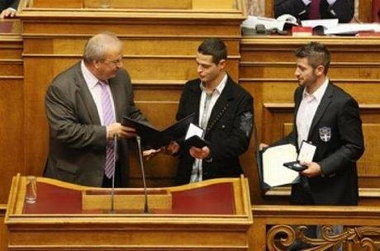 &Eta; &Epsilon;&lambda;&lambda;&eta;&nu;&iota;&kappa;ή &Beta;&omicron;&upsilon;&lambda;ή &tau;ί&mu;&eta;&sigma;&epsilon; &tau;&omicron;&upsilon;&sigmaf; &Omicron;&lambda;&upsilon;&mu;&pi;&iota;&omicron;&nu;ί&kappa;&epsilon;&sigmaf; &mu;&alpha;&sigmaf;