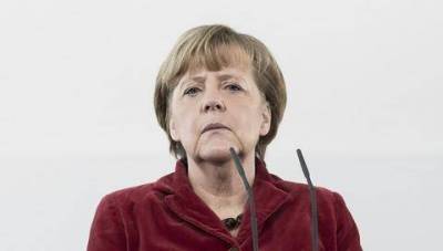 Spiegel: &Mu;έ&rho;&kappa;&epsilon;&lambda; &kappa;&alpha;&iota; &Sigma;ό&iota;&mu;&pi;&lambda;&epsilon; &phi;έ&rho;&epsilon;&tau;&alpha;&iota; &nu;&alpha; &delta;&upsilon;&sigma;&alpha;&rho;έ&sigma;&tau;&eta;&sigma;&epsilon; &omicron; &Nu;&tau;&rho;ά&gamma;&kappa;&iota;