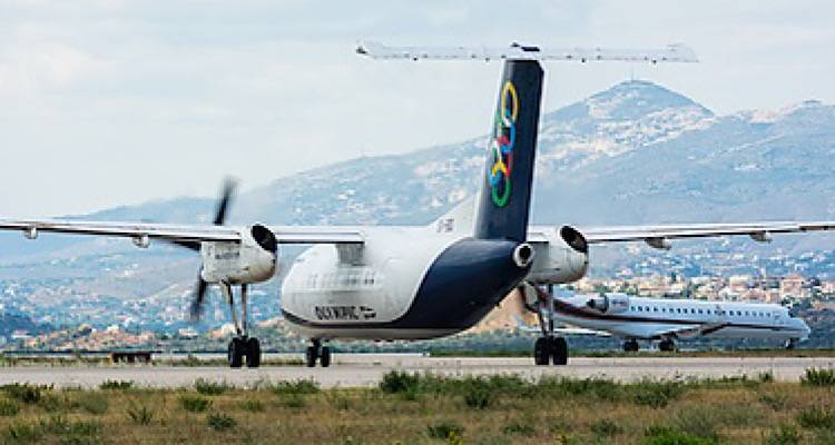 &Lambda;ή&mu;&nu;&omicron;&sigmaf;: &Sigma;&tau;&eta;&nu; Olympic Air &eta; &gamma;&rho;&alpha;&mu;&mu;ή &Theta;&epsilon;&sigma;&sigma;&alpha;&lambda;&omicron;&nu;ί&kappa;&eta;-&Lambda;ή&mu;&nu;&omicron;&sigmaf;-&Iota;&kappa;&alpha;&rho;ί&alpha;